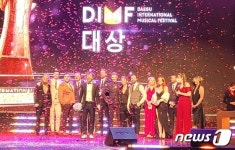 제16회 딤프 대상, 영국 더 콰이어 오브 맨