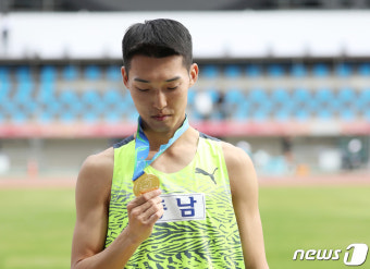 우상혁, 금메달의 무게