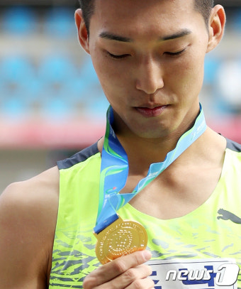 우상혁, 금메달의 무게