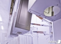 [르포]로봇 팔로 부품 누락 잡는다…경동나비엔 서탄 공장