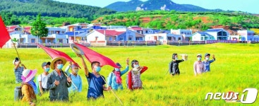 더 높은 알곡 증산으로 보답… 북한 장연군 석장농장