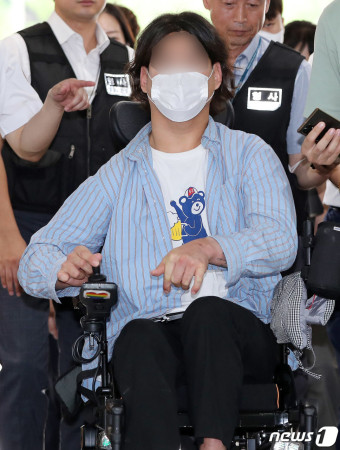 전장연 활동가 유모씨, 공무집행방해 혐의 영장심사