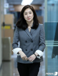 입장하는 김수경 신임 대통령실 대변인