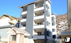 검덕지구에 새 살림집 1000여세대 건설한 북한…행복의 웃음소리