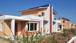 새 살림집이 들어선 북한 황해남도 안악군 군산농장