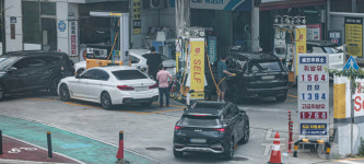 유류세 인하폭 축소 줄서서 주유하는 알뜰주유소