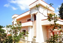 마을 곳곳 당 구호 게시…北 원음농장에 새 살림집 입사모임