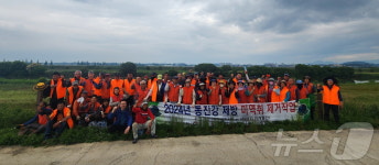 정읍시, 환경단체와 동진강변 생태계 교란종 양미역취 11톤 제거