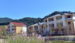 北 장강군에 새 주택들…산골농장의 새 마을