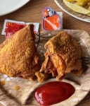 북한에 KFC 케첩이 왜?…치킨에 코카콜라 등장에 눈길