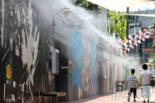 폭염 일주일, 발길 뜸한 김광석길