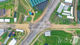 밤사이 내린 폭우로 통제되는 마전봉화교차로