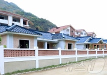 北, 자성군 자작농장과 역수농장서 새집들이 진행