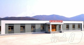 北 라선시 구룡평젖소염소목장 공공건물 준공…현대적인 이상촌