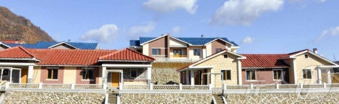 北 양강도 풍서군서 새집들이 경사…어머니당의 은정