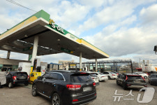 가득 넣어주세요…휘발유값 이란 쇼크에 저가 주유소 문전성시