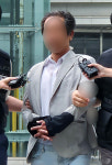 '잠실 개표소 경찰 폭행' 60대 남성 구속 갈림길