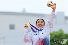 성승민, 한국 첫 금메달