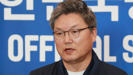 12년 만 쾌거에도 무거웠던 