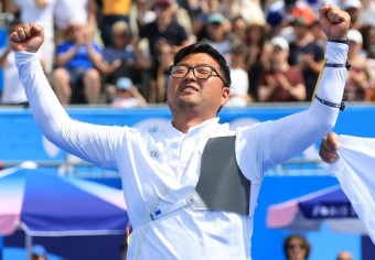 김우진 3관왕 등극…올림픽 역대 최다 금메달리스트