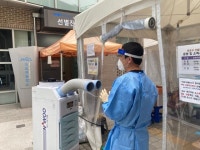 하루 2000명 검사, 인력 충원은 미미… 지쳐가는 일선 방역망