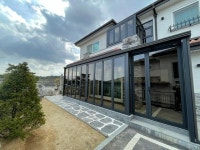 이중유리로 단열성능 높여 폴딩도어 선도