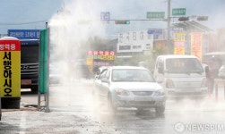 [사진] 방역시설 통과하는 강화도 진입 차량들
