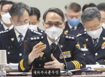 질문에 답변하는 남구준 국가수사본부장