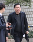 '유동규 휴대전화 인멸' 사실혼 배우자 