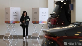 자동차 대리점에서 한표 행사