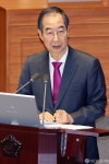 답변하는 한덕수 국무총리