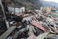 잿더미로 변한 주택