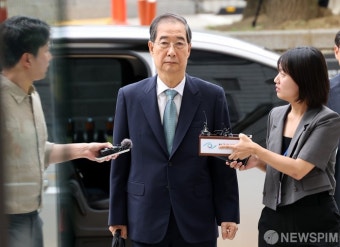 한덕수 전 총리, '묵묵부답' 구속심사 출석