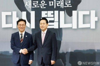 악수하는 장동혁-김민석