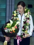 [포토] 꽃다발 목에 건 김연아