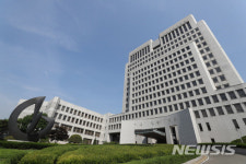 MB재판 진행중에 돌연…담당판사 바꾼 대법원