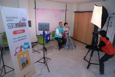 롯데정보통신, 어르신 위한 ‘행복사진’ 봉사활동 진행