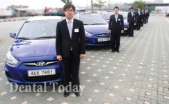 거인씨앤아이, 회사 차에 ‘임플란트 명품’ 로고