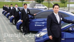 거인씨앤아이, 회사 차에 ‘임플란트 명품’ 로고