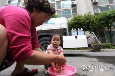 희마아파트급수시설 | '급수차에서 뜬 물로...'