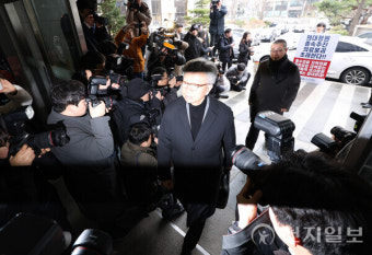 [포토] 경찰 출석하는 김택우 의협 비대위원장과 박명하 조직위원장