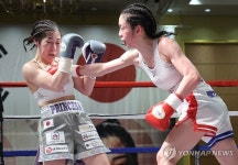의사 복서 서려경, 여자복싱 챔피언 도전 무산… 일본 선수와 혈투 무승부