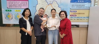 문광면지역사회보장협의체, 출산 가정에 백일 축하금 전달