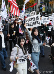 [포토] 이재명 대통령 재판 재개 촉구하는 2030