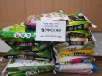 (주)케이에스테크, 정왕2동 행정복지센터에 백미 14포 전달