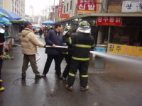 광주남부소방서, 봉선시장 비상소화장치 활용한 화재진압 훈련 실시