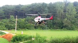 오수관촌농협 첫 항공방제 ‘큰 호응’