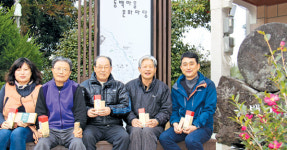 동백꽃 피는 마을 웃음꽃 ‘활짝’