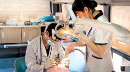 “행복버스서 치과 치료 받으세요”