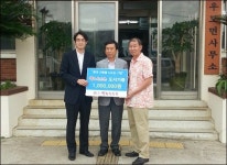 한라산소주, 우도중학교에 100만원 도서 기증